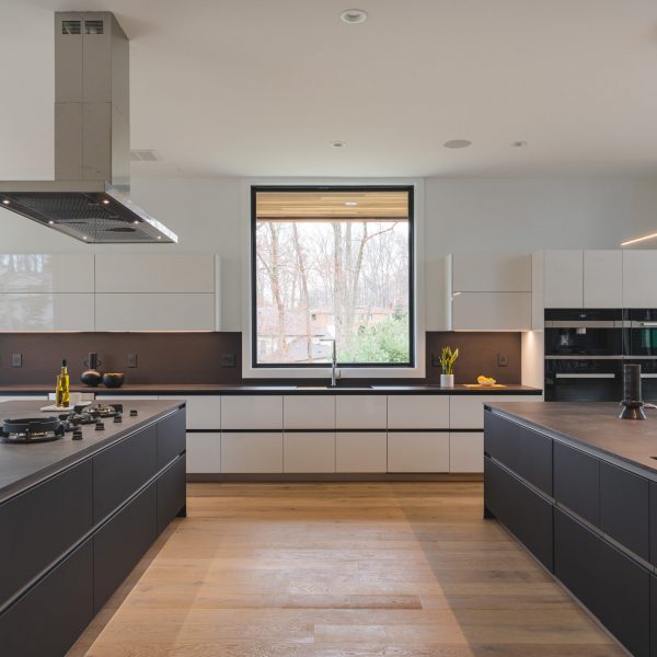 a large kitchen with a large island and stove